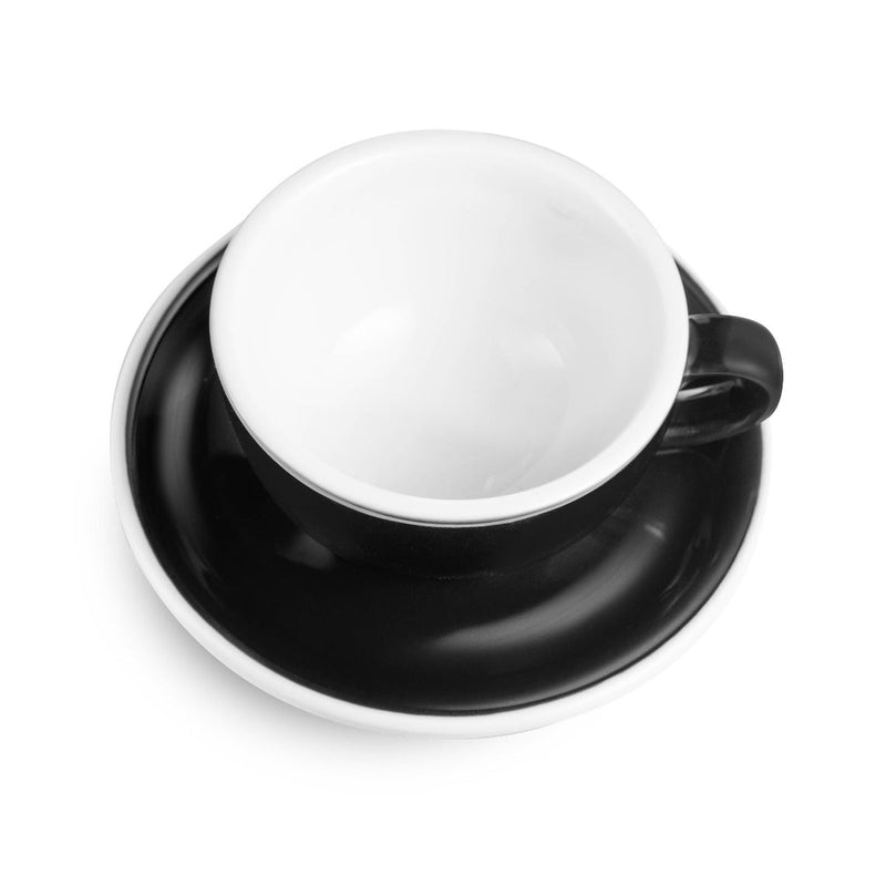 black egg shaped latte cup and saucer