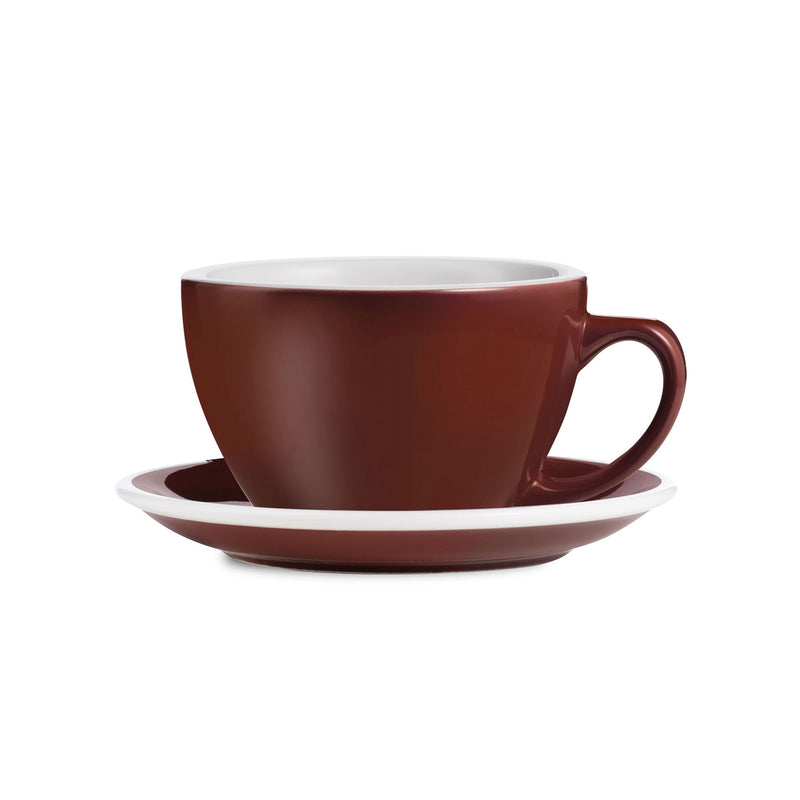 brown egg shaped cappuccino cup and saucer