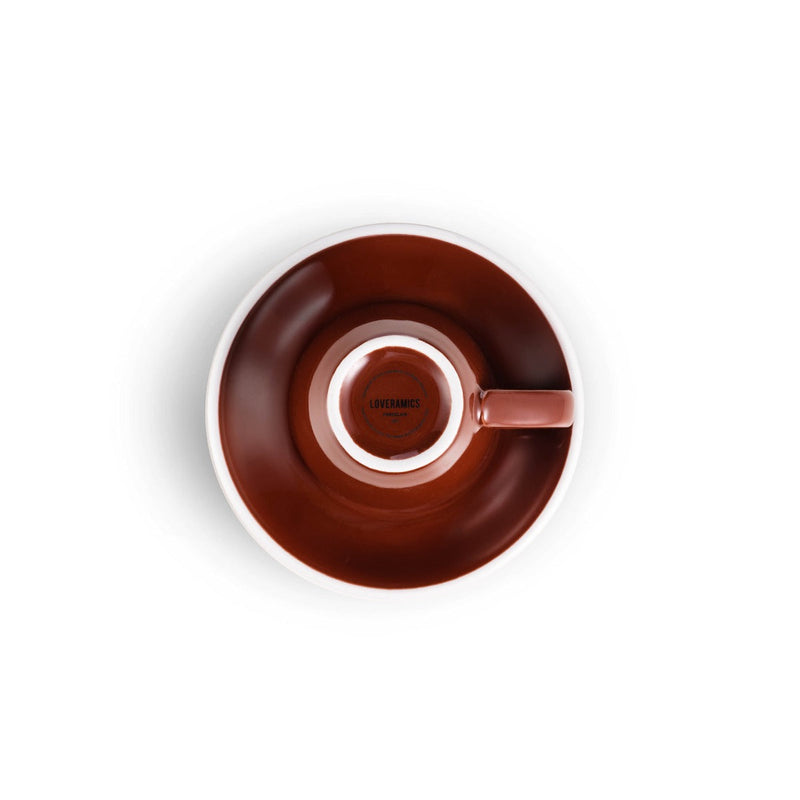 brown egg shaped espresso cup and saucer