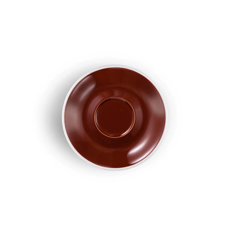 brown egg shaped espresso cup and saucer