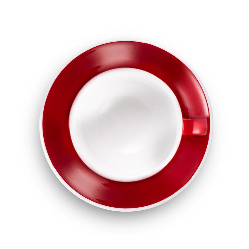 red egg shaped cappuccino cup and saucer