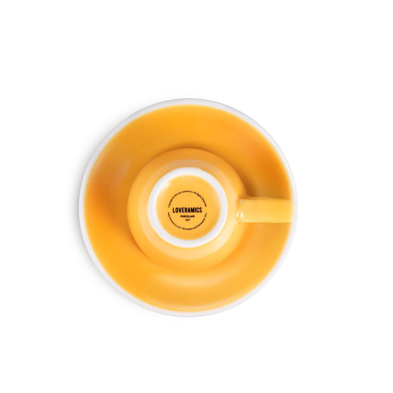 yellow egg shaped espresso cup and saucer